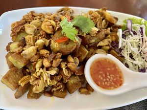 Vegan pork with tumaric  at Ruan Mae Lui Vegetarian เรือนแม่หลุยมังสวิรัติ in Bangkok