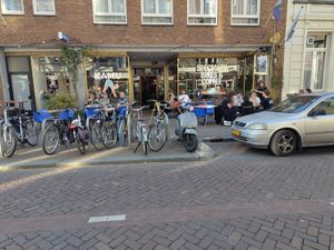 Storefront and terrace at Kamu Koffiebar in Breda