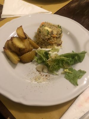 Cous cous e patate al forno   at Terra Ristorante Vegetariano in Caserta