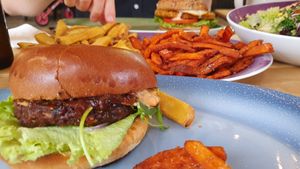 Burgers, fries and salad at Hans im Glück in Spreitenbach