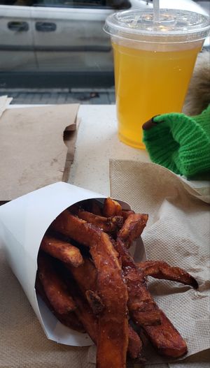Sweet potato fries and turmeric tangerine drink #Veganuary at HipCityVeg - Rittenhouse in Philadelphia