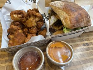 Cauliflower bites accompanied by maple syrup (just say no) and Boom Boom Nutriboom burger before it fell apart    at Bacon Bros Present Shaka Bros in Christchurch