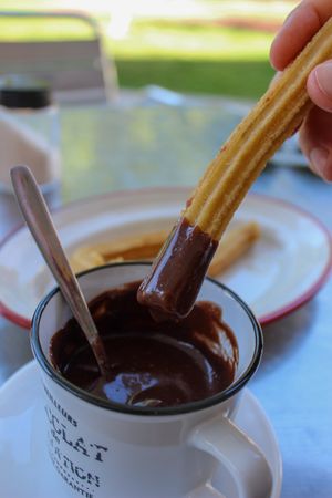 Churros with chocolate with almond milk at Churrería La Gloria in Gijon
