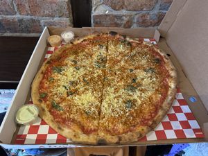 Sausage pizza with dips  at Bambino in Dublin