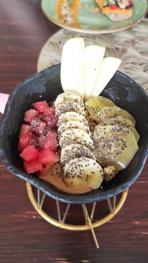 Acai Bowl - very small portion underneath the fruits... at Kalma Café in Lanzarote