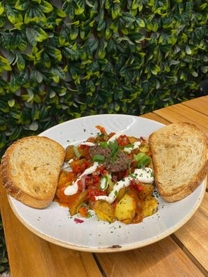 Patatas Bravas with olive tepanade, vegan aoili and sourdough at Little T's in Balcatta