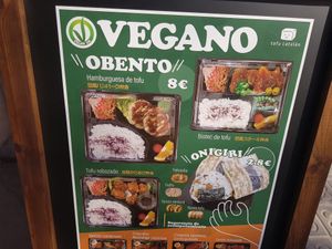 Storefront add promoting vegan options at Somenoya in Barcelona