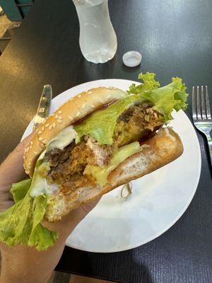 My vegan burger. Pattie had lentils and veggies. Vegan mayo, mustard. Very yum!    at Little Govinda's in Ao Nang