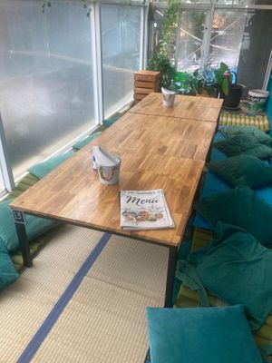 Second floor carpet cushion seating  at Little Govinda's in Ao Nang