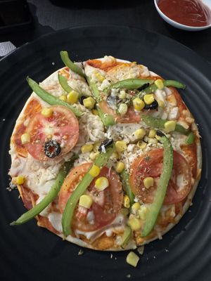 Ok pizza overall, a little small, they do well to be an all vegan restaurant.   at Little Govinda's in Ao Nang