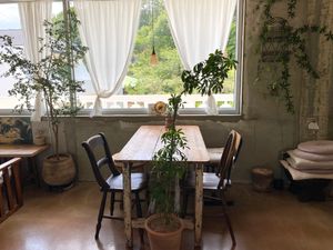 Seating by a window with the mountain view at Ksana 크샤나 in Busan