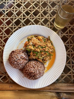 aubergine filled with tofu bolognese & iced tea  at Baobab House in Cape Coast