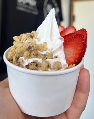 VEGAN SOFT-SERVE ICE CREAM MADE FROM SCRATCH: PICTURE SHOWS BLONDIES VEGAN SOFT-SERVE WITH ADDED VEGAN COOKIE CRUMBLE AND SLICED STRAWBERIES at Blondies Vegan Proteins + Cafe Hawaii in Honolulu