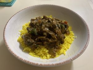 Vegan mushroom curry with basmati rice   at Ravneels Curry House in Burpengary