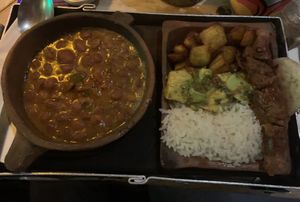 Vegan chorizo with beans, fried plantains, and avocado salad!  at Andrés Carne de Res in Cundinamarca