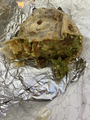 Half of a NoCal burrito (not the best photo…tasted amazing).  at Vegan vs Fries - Cloud Kitchen in Baltimore