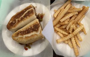 "Sausage" sandwich with fries   at Nola Mia in New Orleans