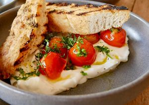 Whipped feta with roasted tomatoes   at Otto Champagneria & Beer Hall in Wellington