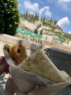 focaccia with onion and  with olives and tomatoes   at Focacceria Genovese in Verona