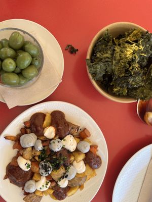 Olives, kale chips and patatas bravas  at Samsara in Barcelona