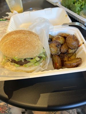 Vegan big mac-ish burger served with roasted potato side  at Janelle's Vegan Kitchen in Amherst