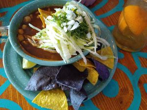 Spicy soup with nachos and giant corn at Alebrijes in Wiesbaden