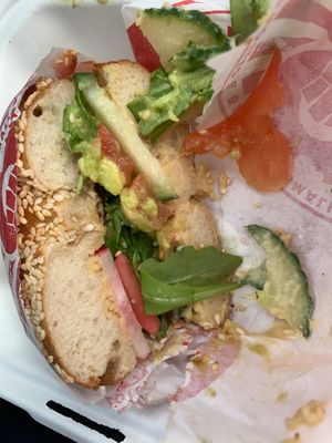 This beautiful sandwich with the pickled veggies *chefs kiss*   at Bagel Uprising in Alexandria