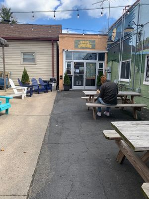 There she is! Such a cute little store front, with all that outdoor seating (more picnic tables not photographed)  at Bagel Uprising in Alexandria
