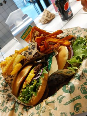 Texas burger and no Chicken burger with normal & sweet potato fries at Bastard Burgers in Helsinki