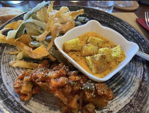 Antipasto misto con verdure pastellate, crema di zucca con crostini di focaccia,  polenta con ragù di verdure   at Kirù Focacceria Bistrot & Drinks in Livorno