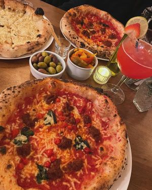 Vegan garlic bread 
Vegan pizza topped with vegan nduja and sweet peppers at Pizzeria La Gaby in Buxton