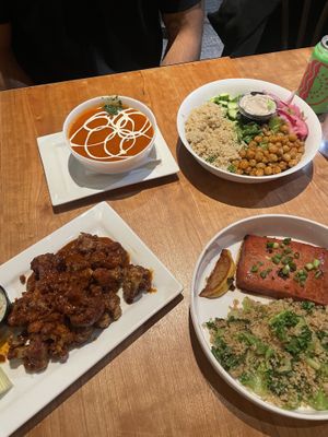 Tomato soup, cauliflower wings, tofu salmon, chickpea and tahini quinoa bowl   at Veg Head in Lansing