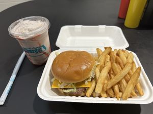 Kali burger with impossible meat and vegan cheese with a vegan strawberry milkshake  at Kaliburger in St Augustine