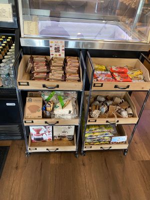 Snack case in front of ice cream case at Zumi's Espresso in Ipswich