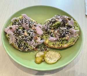 Avo and pickled onion bagel  at Schmucks in Melbourne