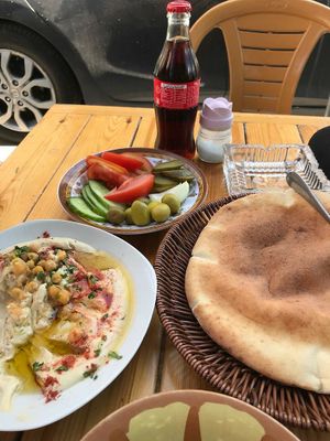 Humus and vegetables at Abu Ashraf Restaurant in Nazareth