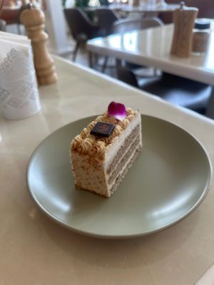 Coconut rose cake at Unicorn Noms in Janabiyah
