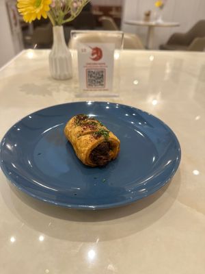 Plant based sausage roll at Unicorn Noms in Janabiyah