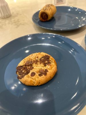 Cookie and plant based sausage roll at Unicorn Noms in Janabiyah