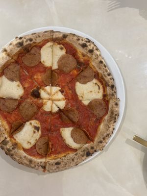 Vegan pepperoni pizzaa  at Unicorn Noms in Janabiyah