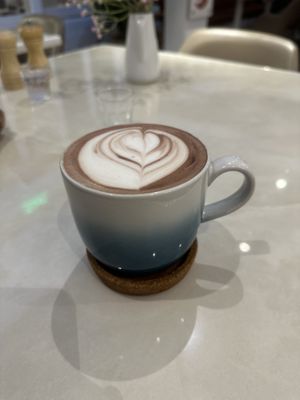 Hot chocolate with oat milkk  at Unicorn Noms in Janabiyah