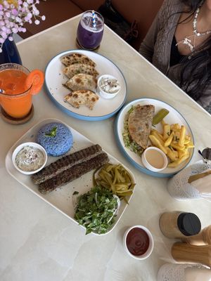 Kebab , arayas and smashed taco  at Unicorn Noms in Janabiyah