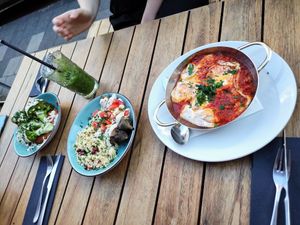Shakshuka (not vegan), barbecued aubergine (eggplant) and broccoli with Muammara at Die Kurve in Dusseldorf