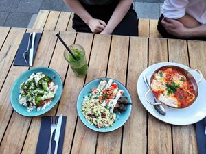 Shakshuka (not vegan), barbecued aubergine (eggplant), and broccoli with Muammara at Die Kurve in Dusseldorf