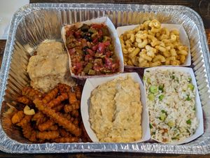 Platter Meal: fries, biscuit, okra and tomatoes, mac & cheese, "tuna" salad, and soul rice. at Vegan Soul in Boise