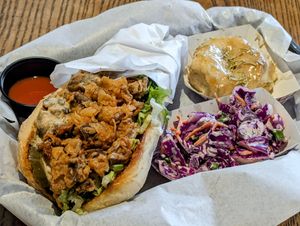 Po' Boy Sandwich with Cole Slaw and a Rosemary Biscuit 🤤 at Vegan Soul in Boise