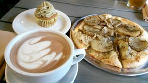 Hot chocolate, rosemary potato flatbread, and matcha cupcake at Green Bliss - the Cafe in Fullerton