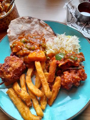 Onion bhaji 
Cauliflower manchurian
Grandmas Aloo matra
Dum pulao rice
Chacha chips
Tandoori roti at My Delhi Sunderland Indian Restaurant in Sunderland