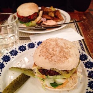 Two of three new vegan burgers. Very tasty and great value (50 SEK)! Extras such as potato wedges and coleslaw are 20 SEK each. Love this place!! at Kafe 44 in Stockholm