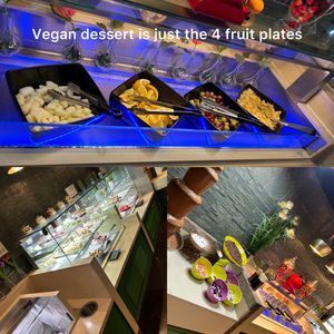 Dessert, orange slice, tinned pineapple, melon and grapes   at Panda Mami in York